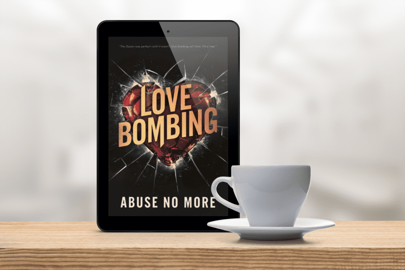 Love Bombing book cover on tablet with a cup of coffee